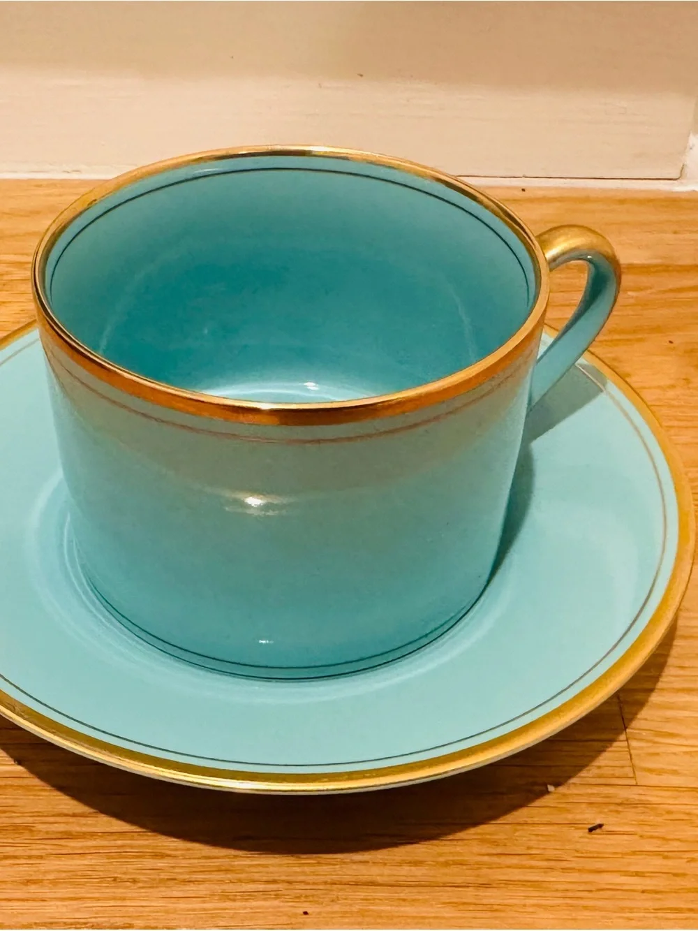 Fitz and Floyd Turquoise and Gold Porcelain Cup and Saucer